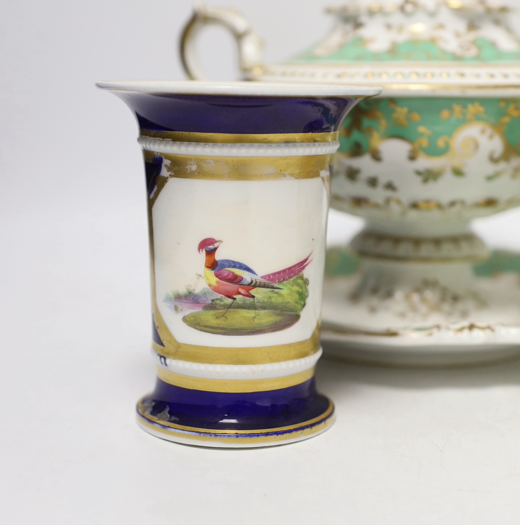 Early 19th century English porcelain including a Wedgwood pot pourri bowl and cover, two sauce tureens covers with integral stands, a butterfly painted trio and a bird painted spill vase